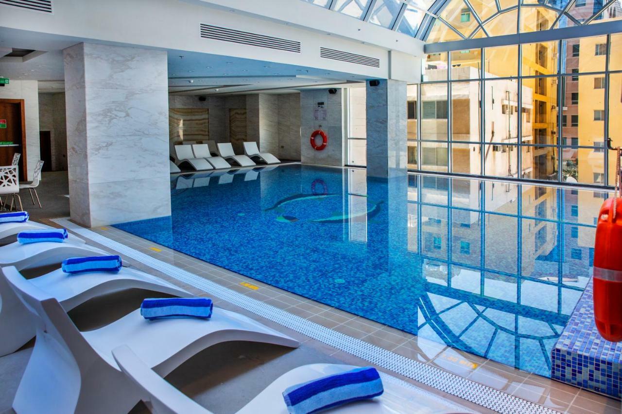 Century Hotel Doha Bagian luar foto